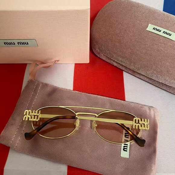 Miu Miu Gold Sunglasses with Amber Lenses